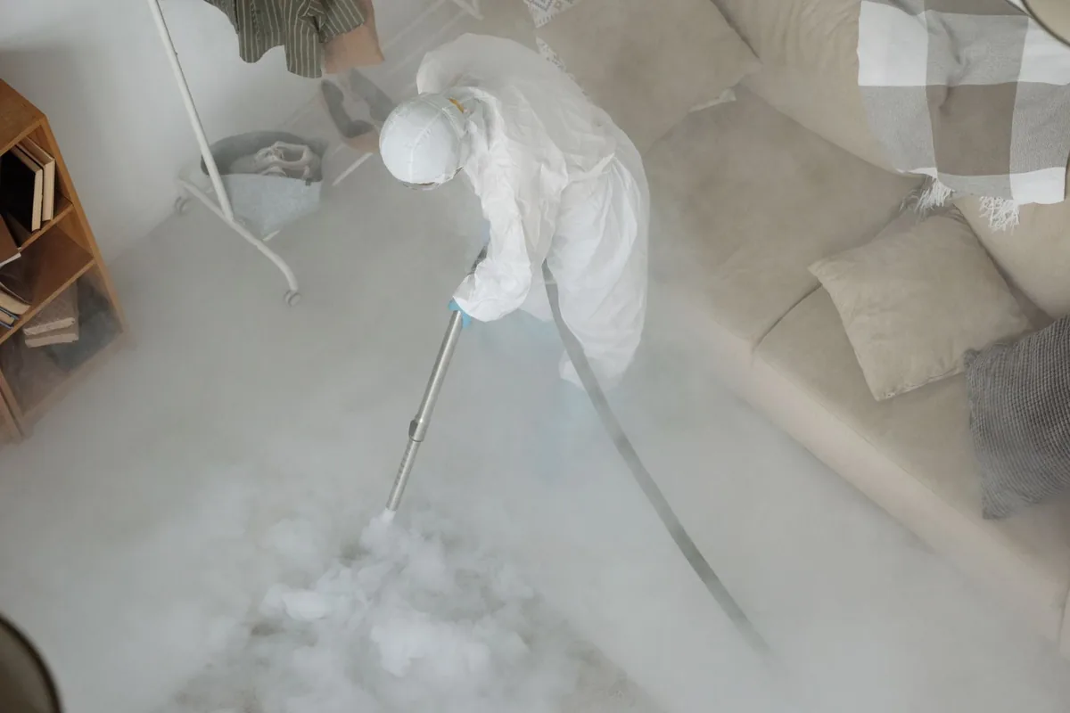Biohazard cleanup technician in protective equipment, Lewiston, UT